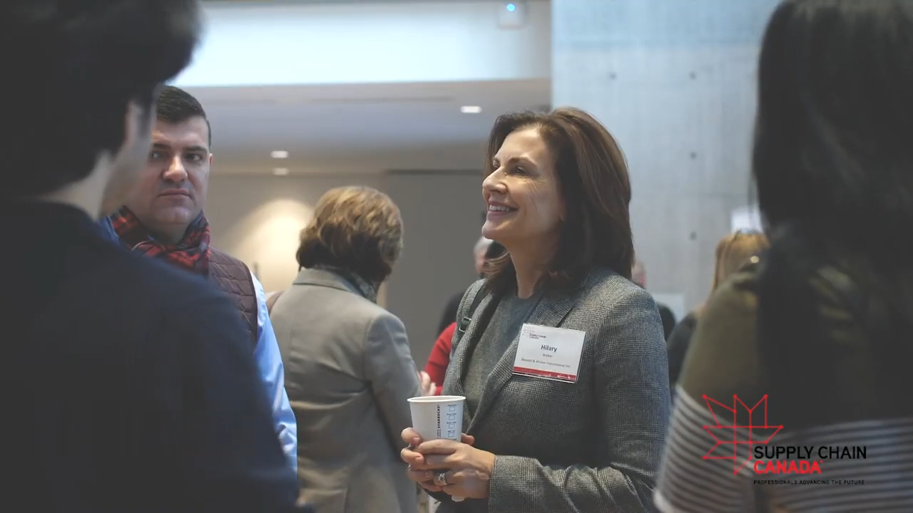 Professionals networking over coffee at the Leadership Series