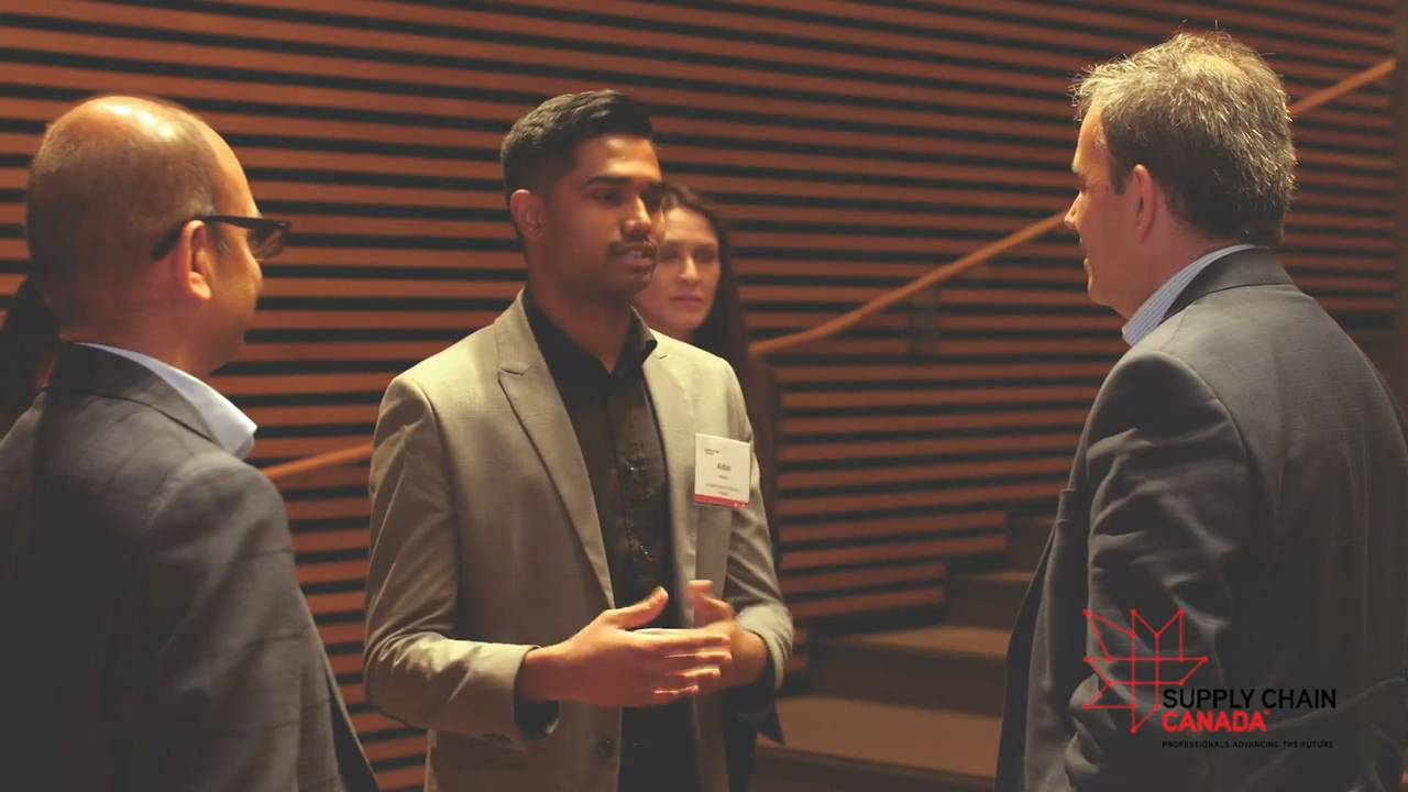 Attendees in conversation at the Leadership Series networking reception